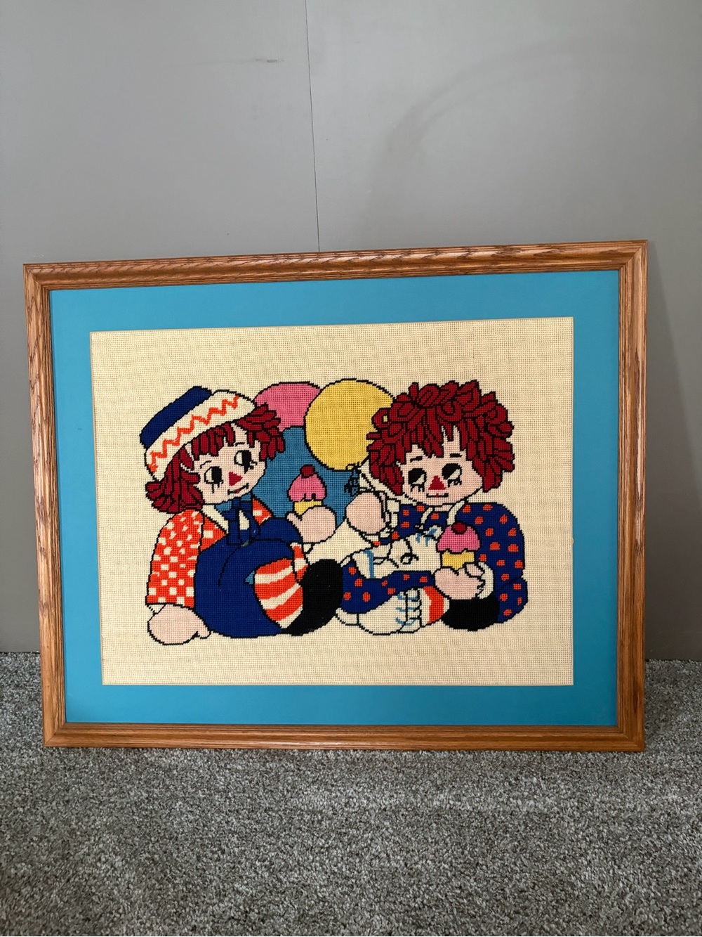 Vintage  Raggedy Ann and Andy Wall needlepoint onBlue Mat with oak frame